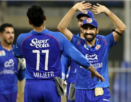 Afghan players celebrating after dismissing UAE captain Mohammad Wasim . Afghan players celebrating after dismissing UAE captain Mohammad Wasim .