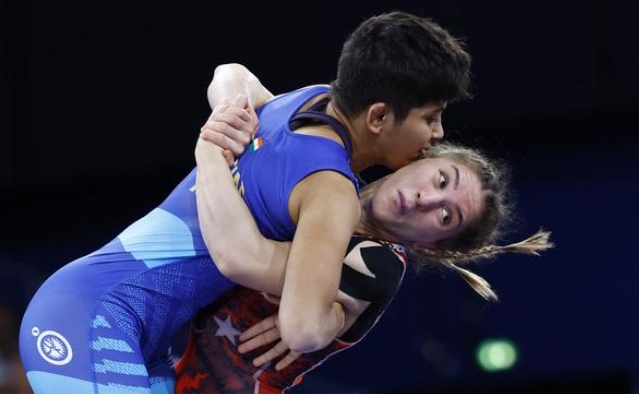 A scene from the match between Antim Panghal of India and Sweden’s Olympic wrestler Emma Jonna Denise Malmgren captures their intense contest at the World Wrestling Championships in Zagreb, Croatia .