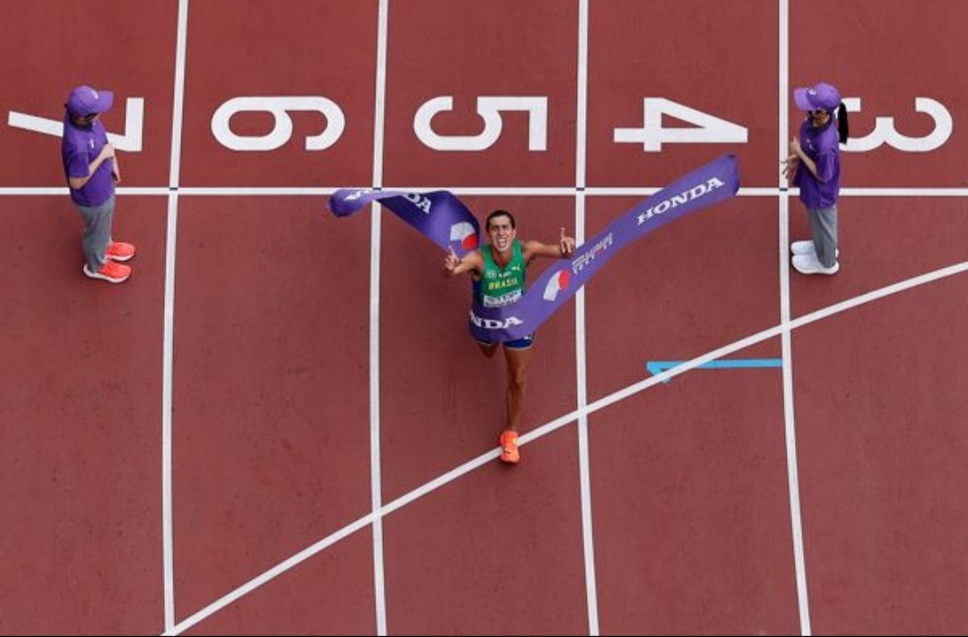Brazil's Caio Bonfim crossing the finish line as he claims his first global gold medal