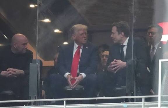 President Donald Trump, left, and Elon Musk talk during a memorial for Charlie Kirk, Sunday, September 21, 2025, at State Farm Stadium in Glendale, Ariz
