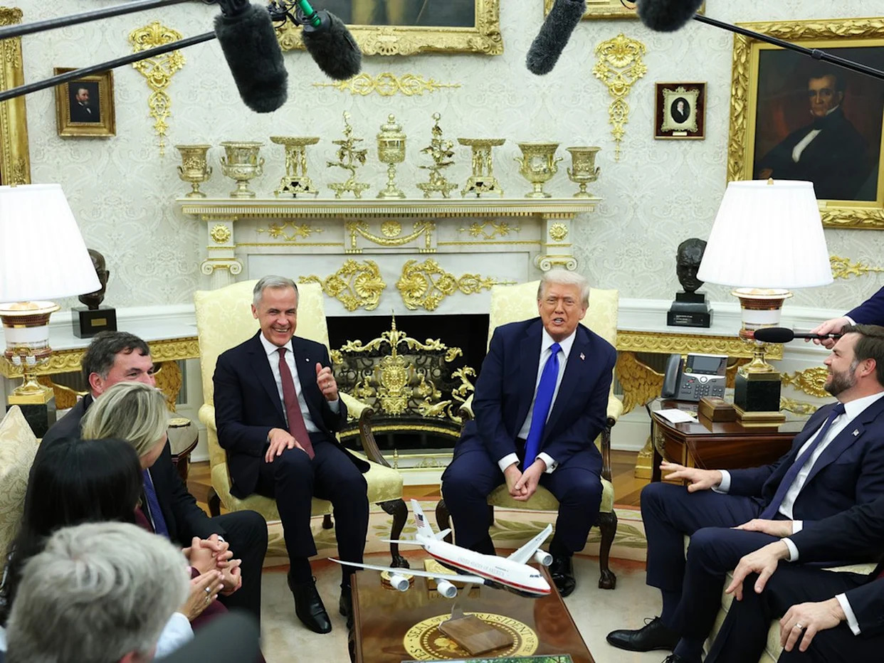 U.S. President Donald Trump and Canada's Prime Minister Mark Carney react as they meet in the Oval Office at the White House in Washington, D.C., U.S., U.S. President Donald Trump and Canada's Prime Minister Mark Carney react as they meet in the Oval Office at the White House in Washington, D.C., U.S.,