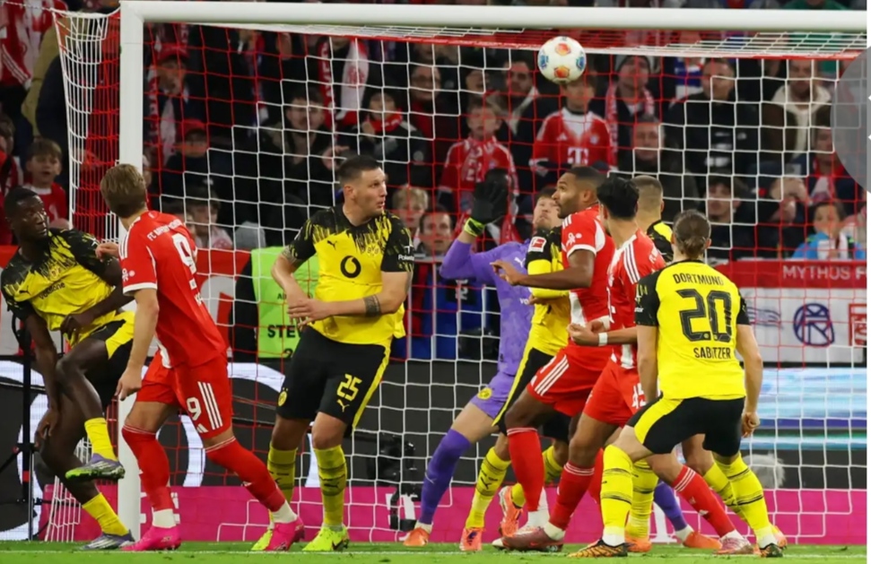 Kane's Landmark Goal Keeps Bayern's Perfect Run Alive in Bundesliga Classic Kane's Landmark Goal Keeps Bayern's Perfect Run Alive in Bundesliga Classic
